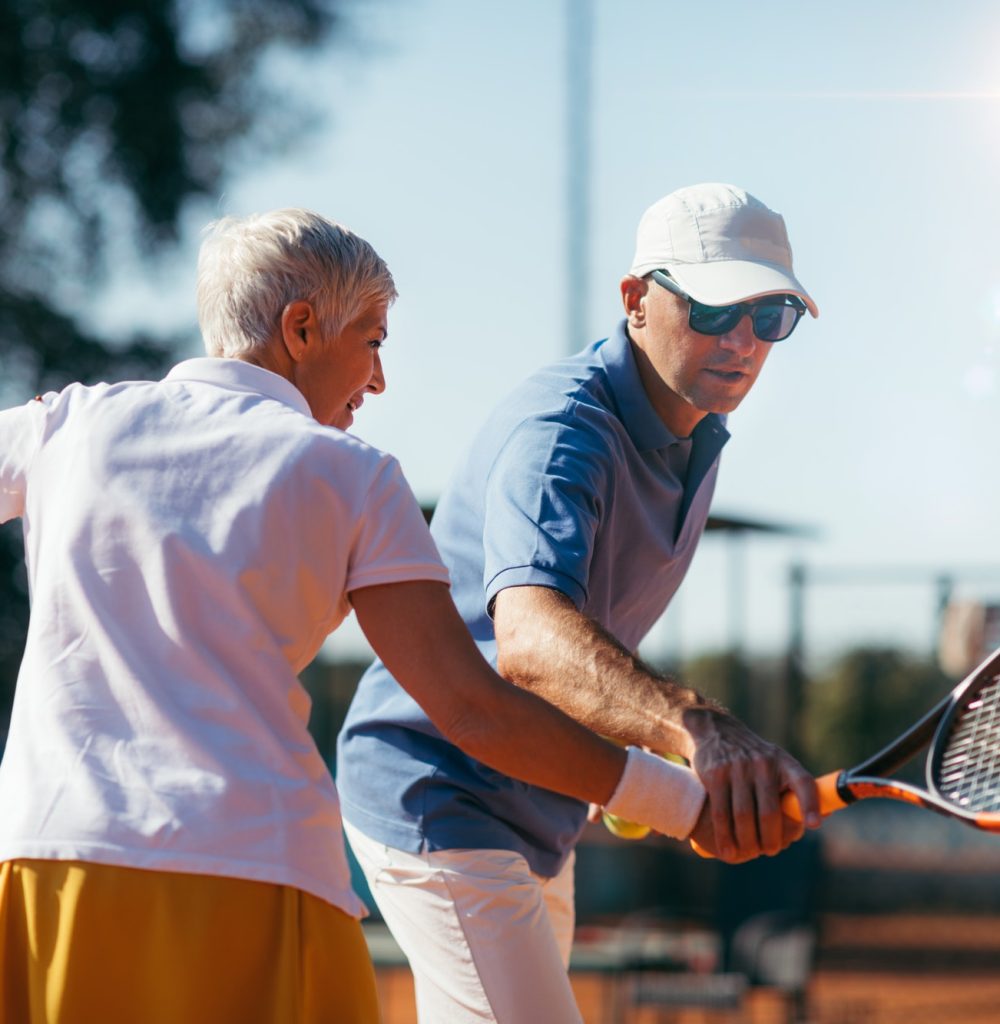 beautiful-mature-active-woman-playing-tennis.jpg